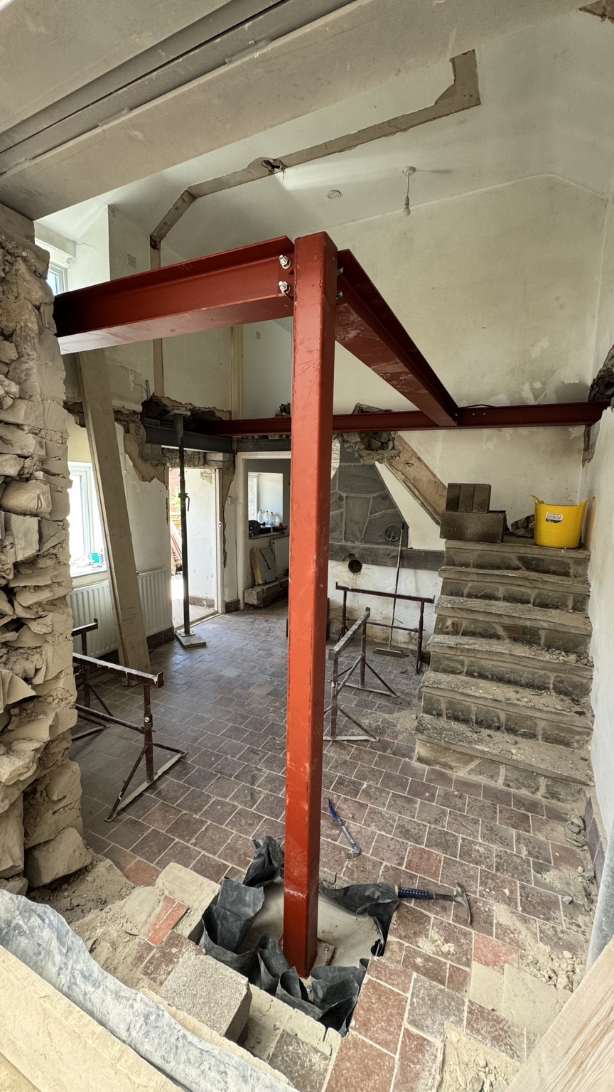 Structural steelwork installed inside the cottage