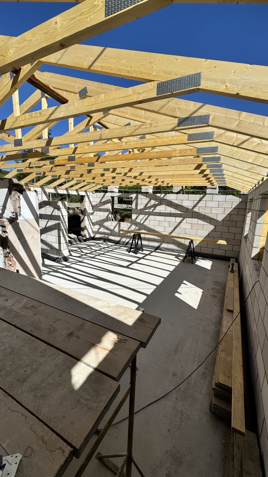 New roof trusses over the rebuilt extension