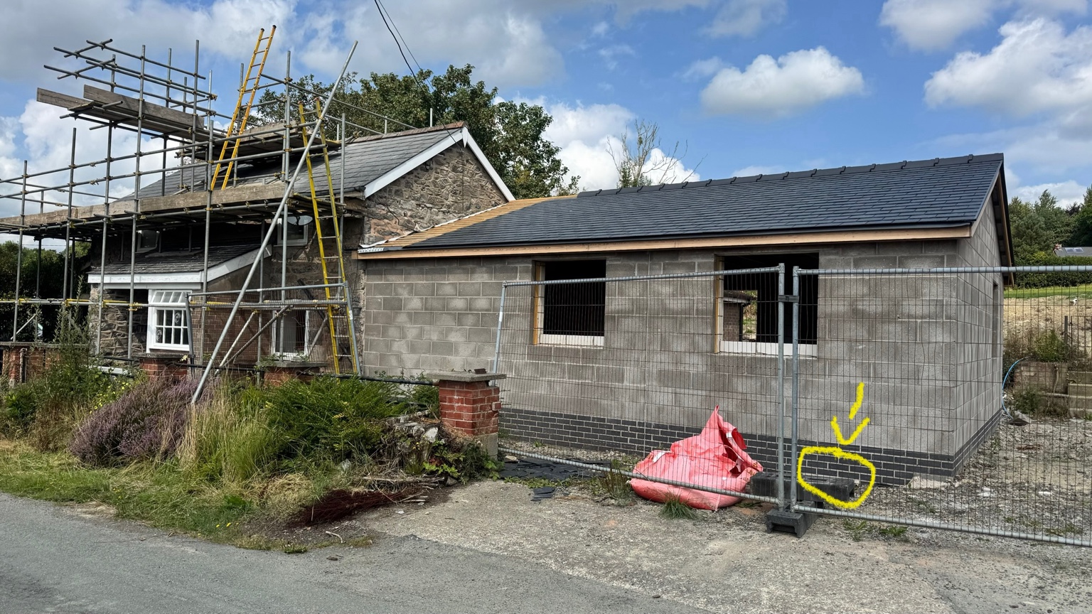 Rebuilt extension with roof and external walls complete