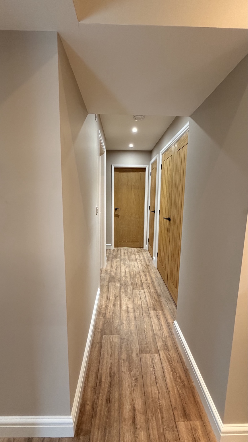 New flooring and joinery through the hallway