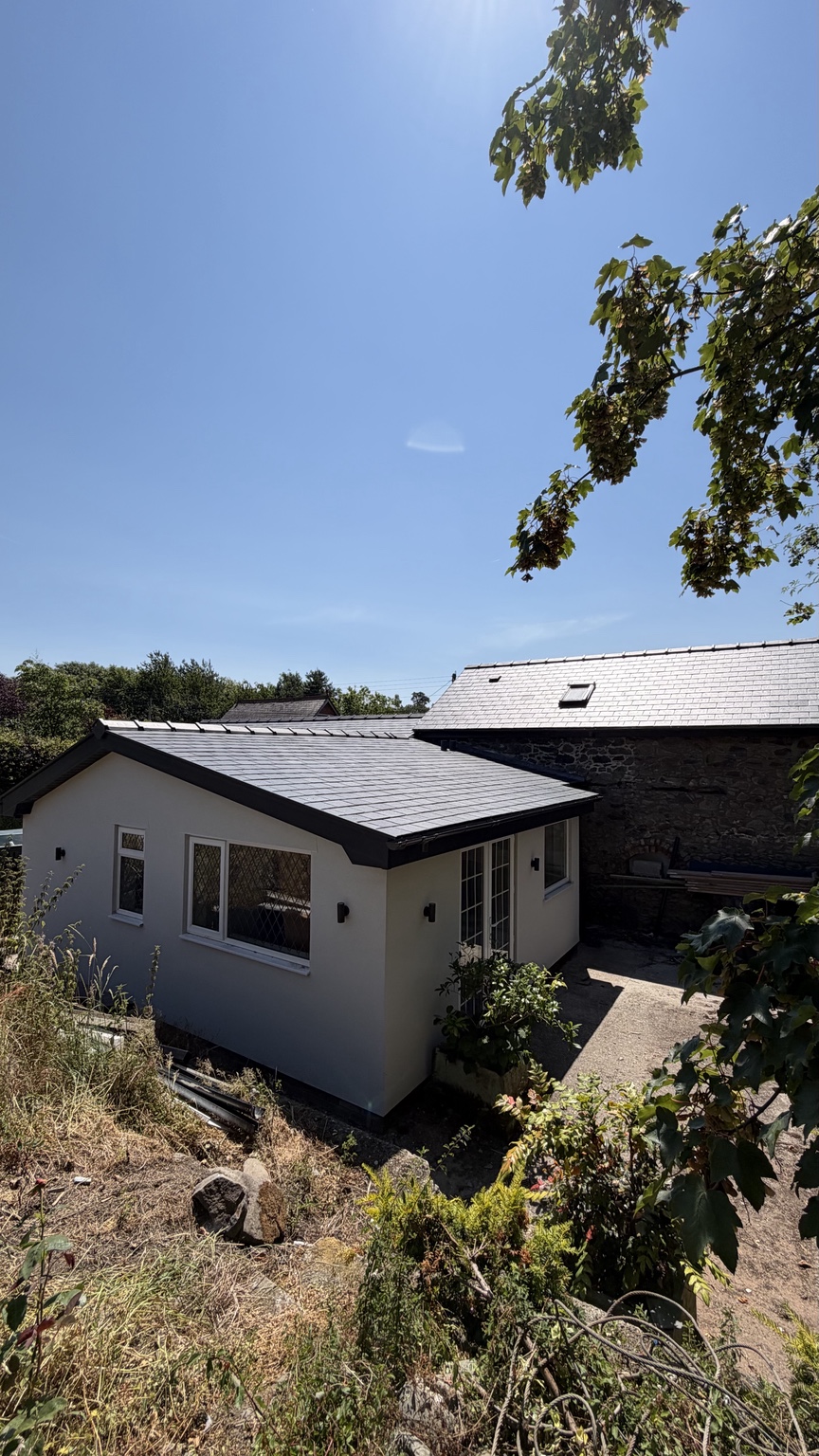 Exterior view of the completed roof and extension