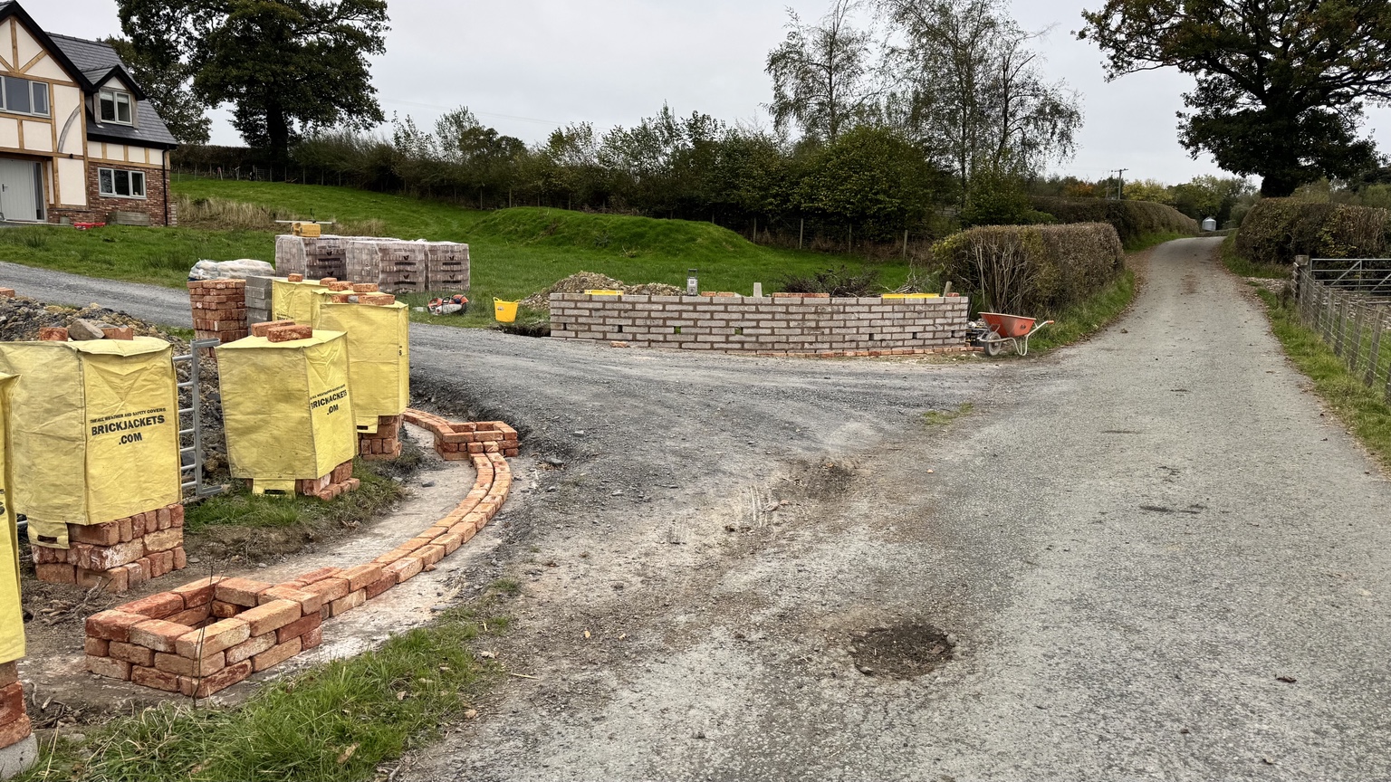 Curved entrance walls taking shape during the brickwork stage