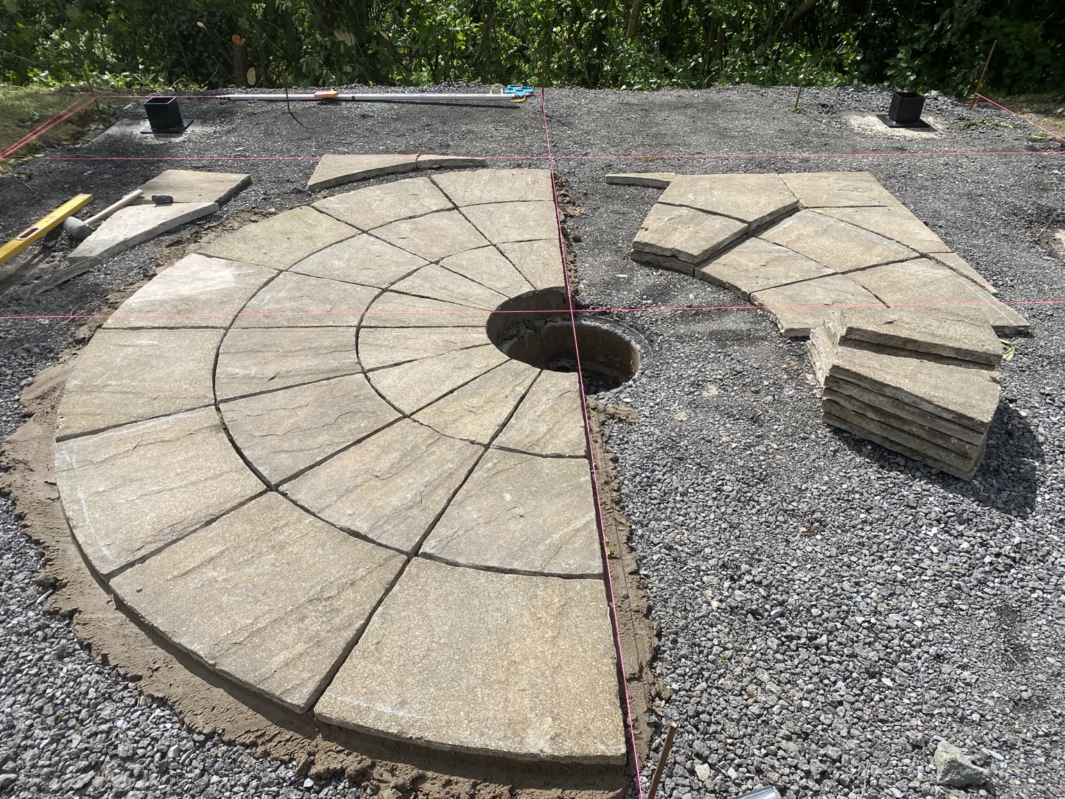 Circular Indian sandstone feature during the laying stage