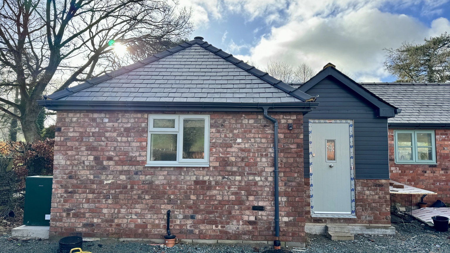 Completed brick extension in Llanfechain