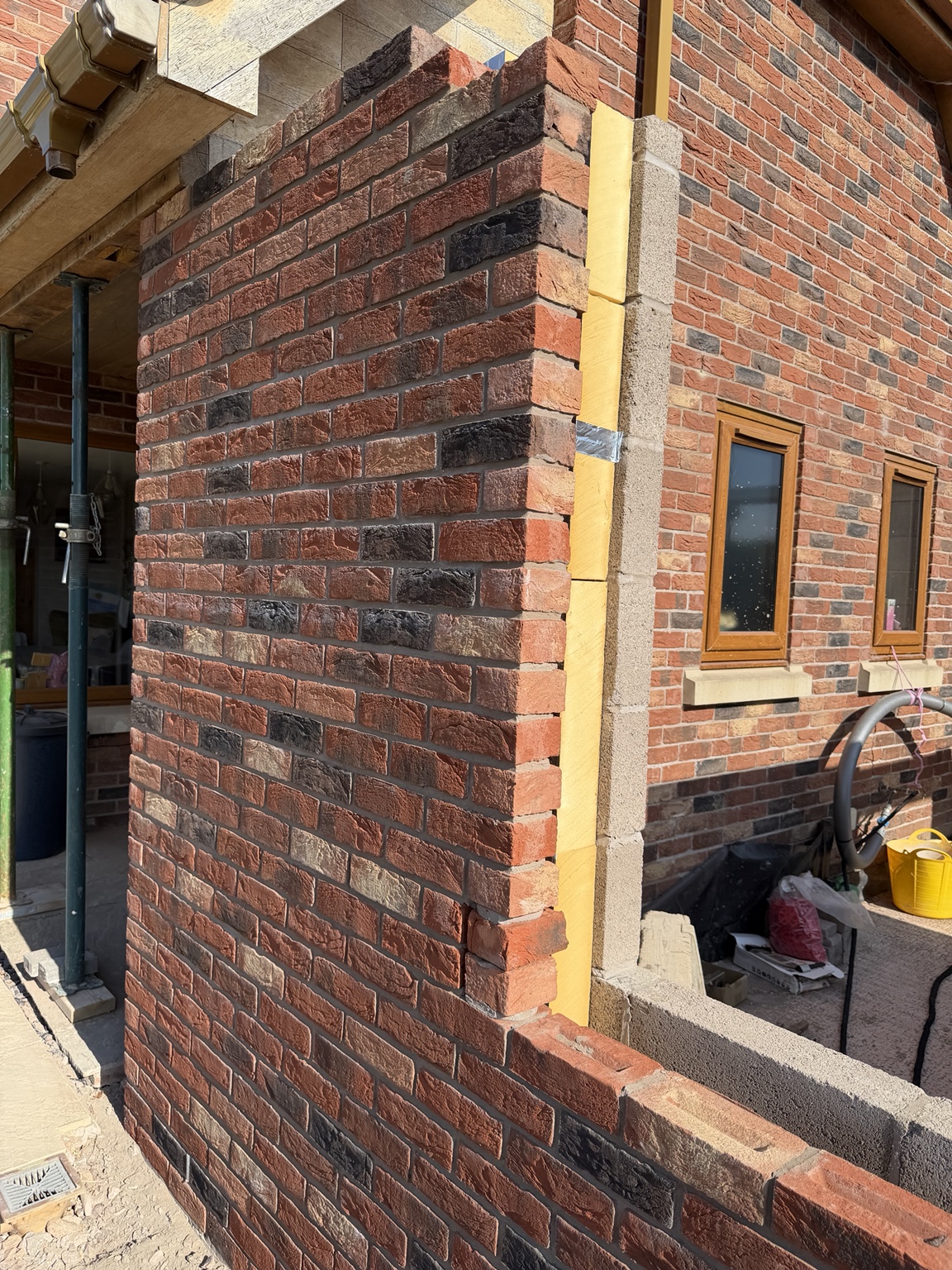 Extension at wall plate and scaffold stage
